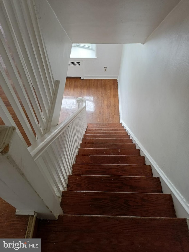 1420 Magee Ave, Philadelphia, PA 19111 - staircase featuring wood finished floors and baseboards