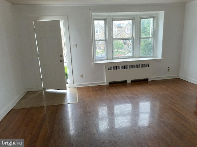 1420 Magee Ave, Philadelphia, PA 19111 - foyer featuring radiator heating unit and wood finished floors