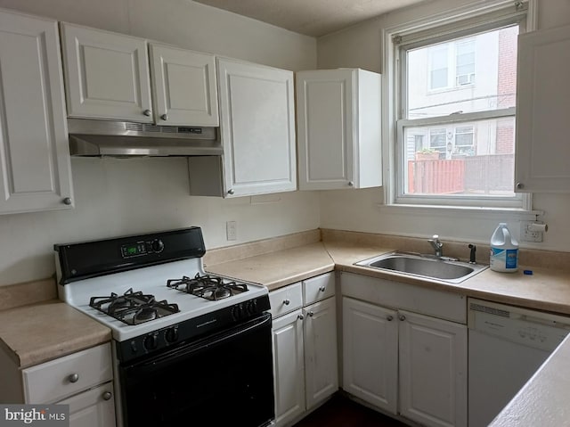 1420 Magee Ave, Philadelphia, PA 19111 - kitchen with gas stove, under cabinet range hood, dishwasher, and white cabinetry