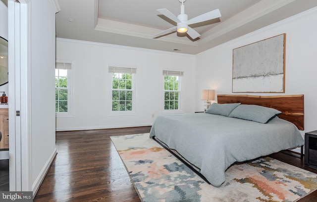 712 Arch Hall Ln, Alexandria, VA 22314 - bedroom with a tray ceiling, wood finished floors, crown molding, and ceiling fan