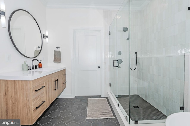 712 Arch Hall Ln, Alexandria, VA 22314 - bathroom featuring ornamental molding, vanity, a shower stall, and tile patterned flooring