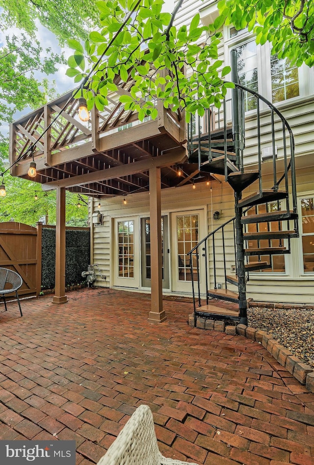 712 Arch Hall Ln, Alexandria, VA 22314 - view of patio / terrace featuring stairway and a gate