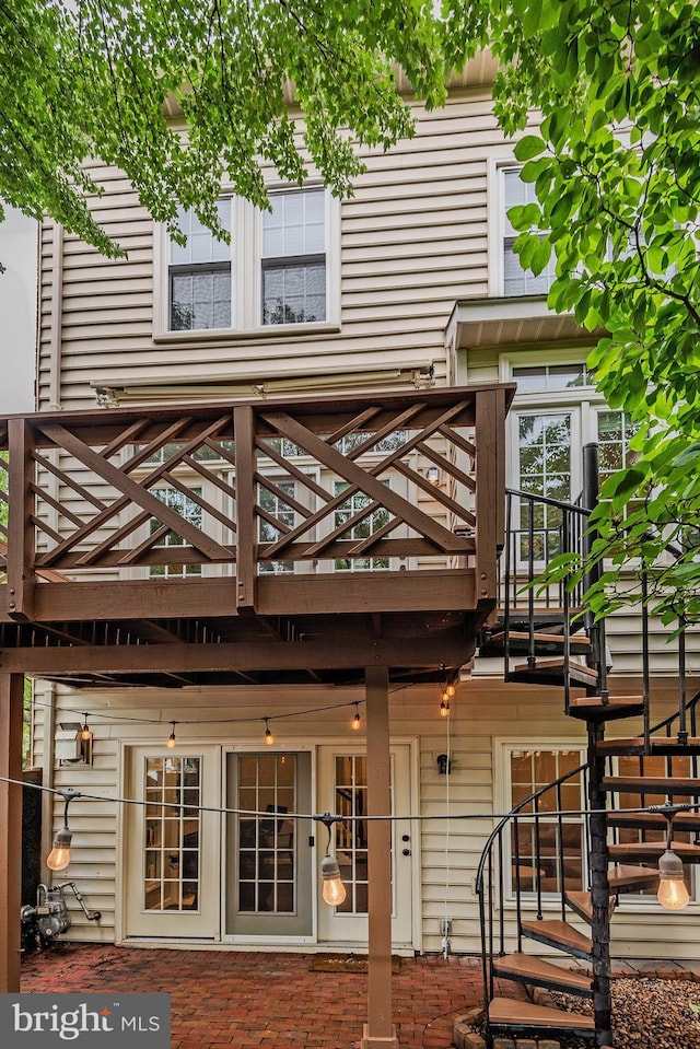 712 Arch Hall Ln, Alexandria, VA 22314 - back of property with a patio and a deck