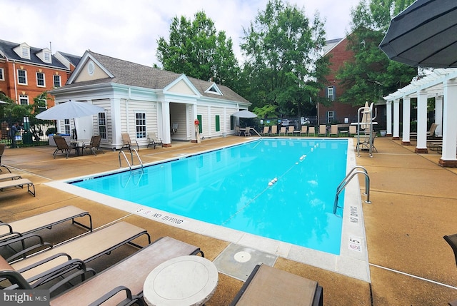 712 Arch Hall Ln, Alexandria, VA 22314 - community pool featuring a patio area