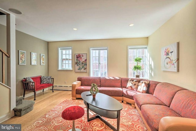 1831MUTLI-UNIT Spruce St, Philadelphia, PA 19103 - living area with light wood finished floors, healthy amount of natural light, stairway, baseboard heating, and recessed lighting