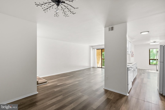 435 Christopher Ave Unit 23, Gaithersburg, MD 20879 - unfurnished living room featuring dark wood-style flooring and healthy amount of natural light