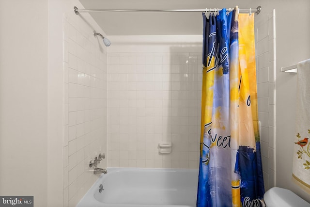 435 Christopher Ave Unit 23, Gaithersburg, MD 20879 - bathroom with shower / bathtub combination with curtain and toilet