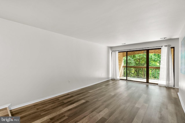 435 Christopher Ave Unit 23, Gaithersburg, MD 20879 - empty room featuring dark wood-type flooring and baseboards