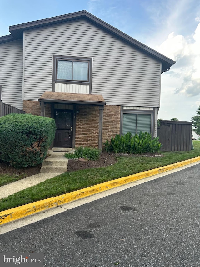 123 Big Chimney Br Unit 9-4, Upper Marlboro, MD 20774 - view of front facade featuring brick siding