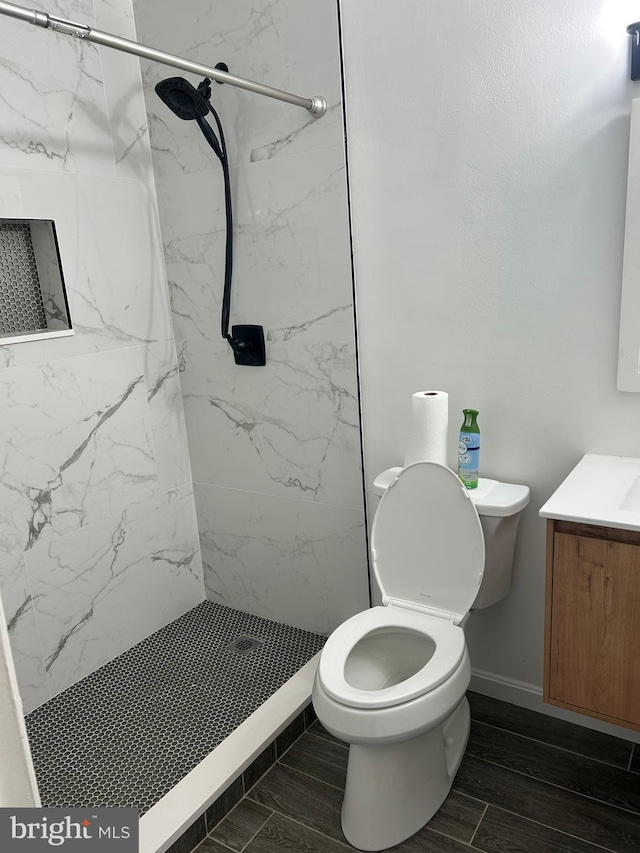 123 Big Chimney Br Unit 9-4, Upper Marlboro, MD 20774 - full bathroom with vanity, a marble finish shower, and wood finish floors