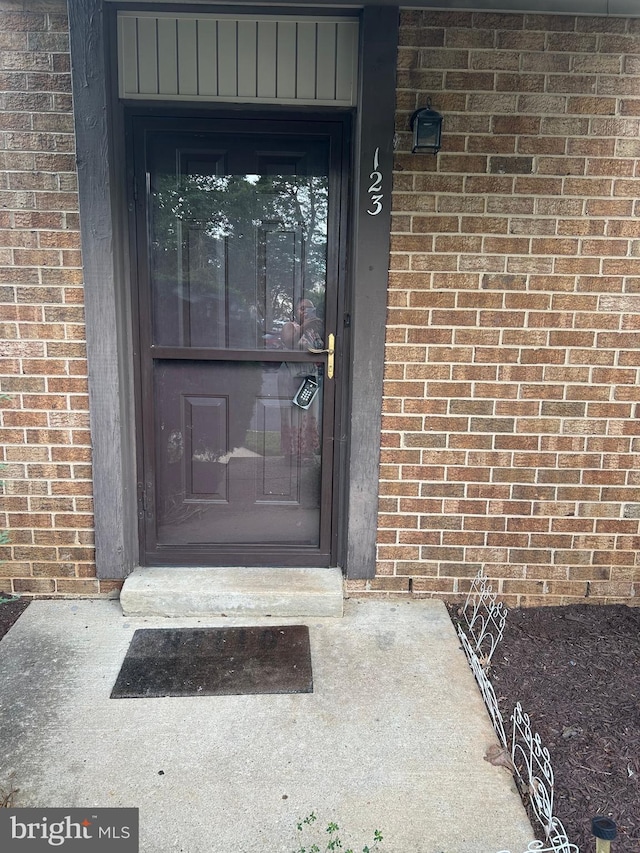 123 Big Chimney Br Unit 9-4, Upper Marlboro, MD 20774 - view of exterior entry with brick siding