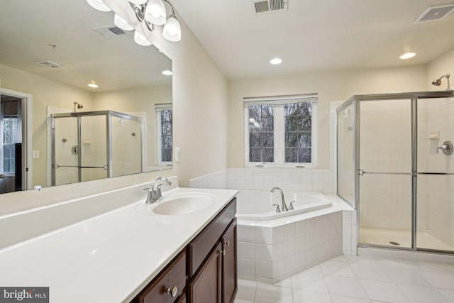 15219 N Berwick Ln, Upper Marlboro, MD 20774 - full bath with a bath, a stall shower, tile patterned floors, vanity, and recessed lighting