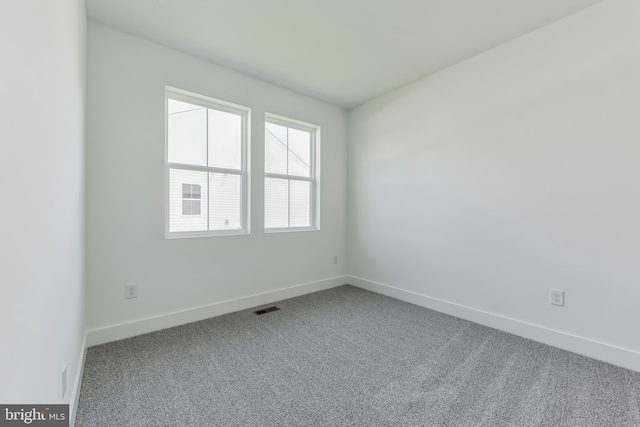 36365 Gate Dr, Georgetown, DE 19947 - carpeted spare room with baseboards