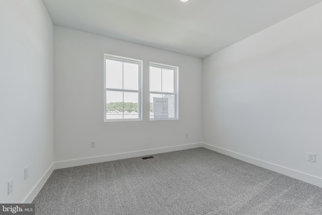 36365 Gate Dr, Georgetown, DE 19947 - carpeted empty room with baseboards