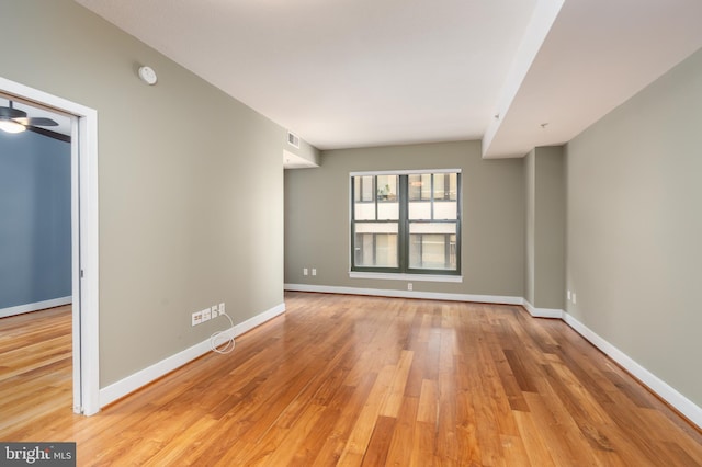 910 M St NW Unit 708, Washington, DC 20001 - spare room featuring wood finished floors and a ceiling fan
