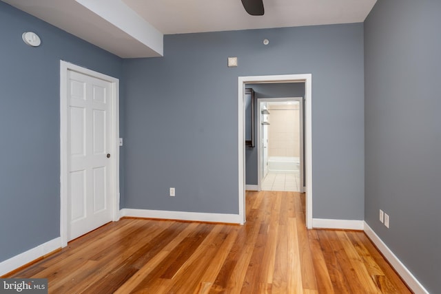 910 M St NW Unit 708, Washington, DC 20001 - unfurnished bedroom featuring light wood-style flooring and baseboards