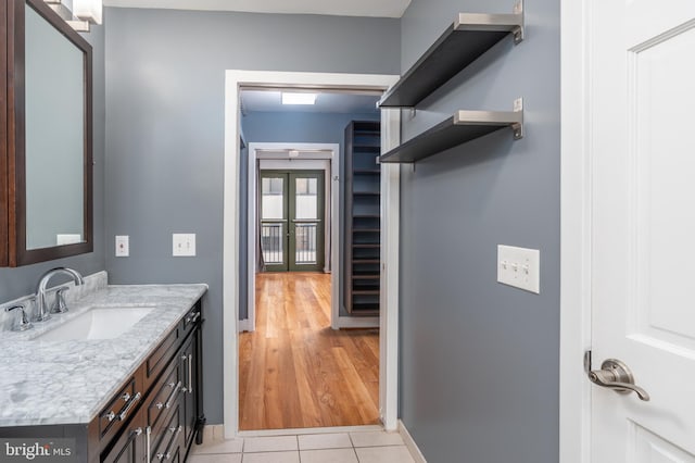 910 M St NW Unit 708, Washington, DC 20001 - bathroom with vanity and tile patterned flooring