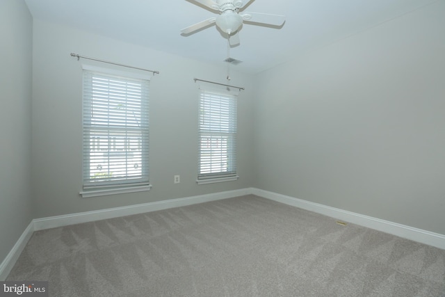 2066 Capstone Cir, Herndon, VA 20170 - carpeted spare room featuring a ceiling fan and plenty of natural light