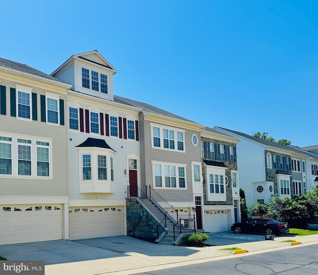 2066 Capstone Cir, Herndon, VA 20170 - multi unit property with an attached garage and concrete driveway