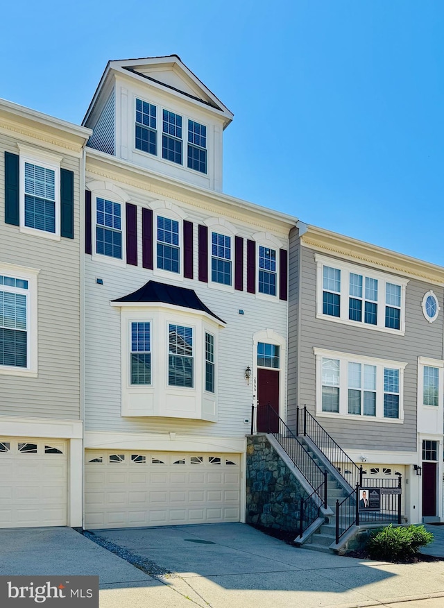 2066 Capstone Cir, Herndon, VA 20170 - multi unit property with an attached garage and driveway