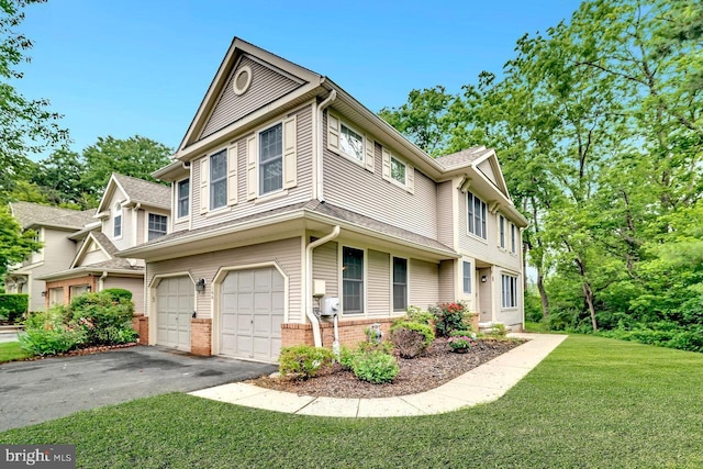 166 Neil Ct, Princeton, NJ 08540 - view of front of property featuring a front lawn, asphalt driveway, a garage, and brick siding