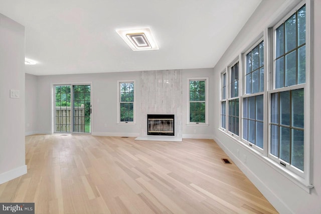 166 Neil Ct, Princeton, NJ 08540 - unfurnished living room featuring light wood finished floors and a large fireplace