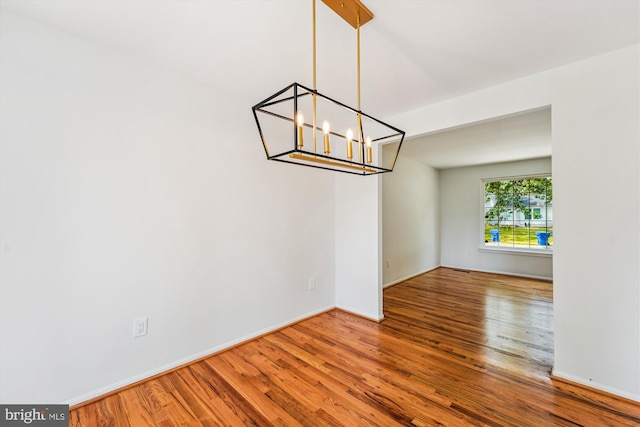4376 Rock Ct, Waldorf, MD 20602 - unfurnished room with wood finished floors and a chandelier