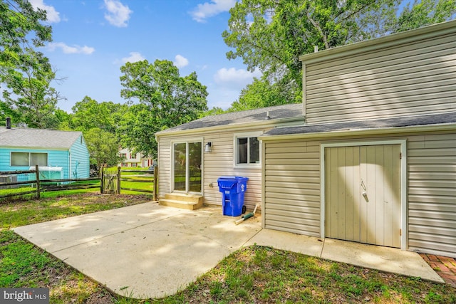 4376 Rock Ct, Waldorf, MD 20602 - rear view of property with a patio area and a shingled roof
