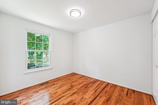 4376 Rock Ct, Waldorf, MD 20602 - unfurnished room featuring wood finished floors and baseboards