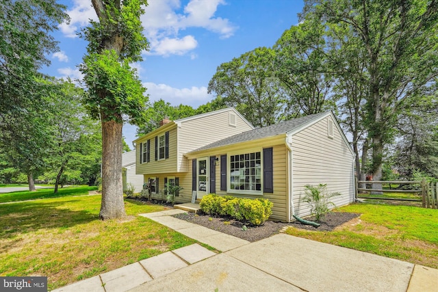 4376 Rock Ct, Waldorf, MD 20602 - tri-level home with a chimney and roof with shingles