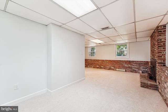 4376 Rock Ct, Waldorf, MD 20602 - basement featuring brick wall, carpet floors, and a drop ceiling