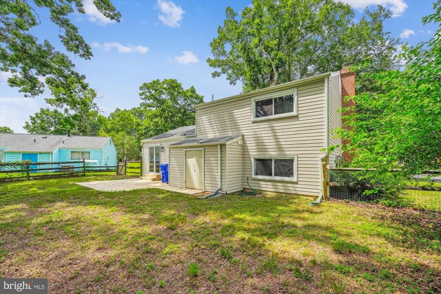4376 Rock Ct, Waldorf, MD 20602 - back of house with a patio and a chimney
