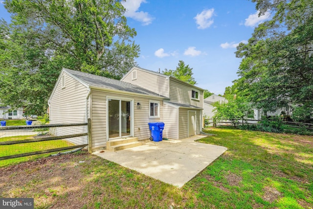 4376 Rock Ct, Waldorf, MD 20602 - rear view of property with entry steps, a patio, and a shingled roof