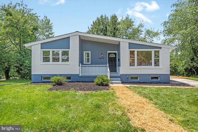 3402 Stevenswood Ct, Baltimore, MD 21244 - view of front of house with a front lawn and a porch