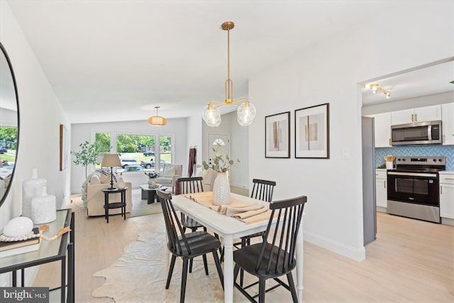 3402 Stevenswood Ct, Baltimore, MD 21244 - dining space with light wood-style flooring and plenty of natural light