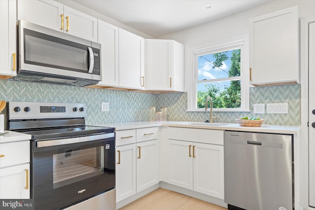 3402 Stevenswood Ct, Baltimore, MD 21244 - kitchen with appliances with stainless steel finishes, light countertops, and white cabinets