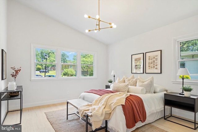 3402 Stevenswood Ct, Baltimore, MD 21244 - bedroom featuring a chandelier, light wood-type flooring, and vaulted ceiling