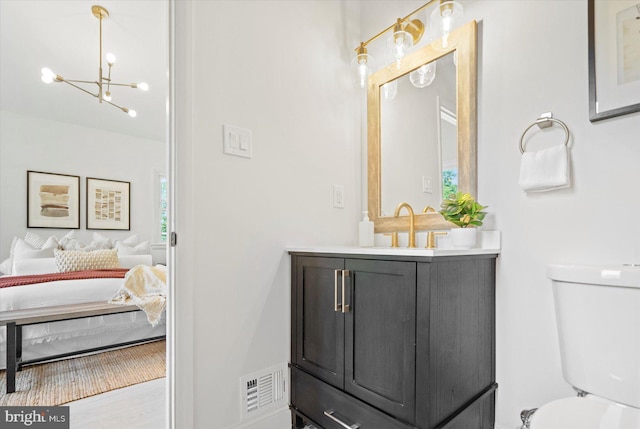 3402 Stevenswood Ct, Baltimore, MD 21244 - bathroom with vanity, a chandelier, and ensuite bathroom