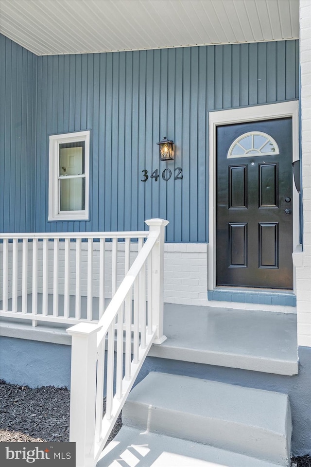 3402 Stevenswood Ct, Baltimore, MD 21244 - doorway to property featuring covered porch