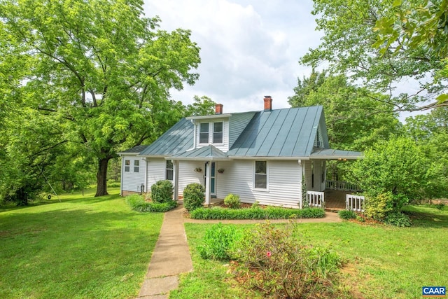 343 Burnt Tree Way, Orange, VA 22960 - bungalow-style home featuring a standing seam roof, a front lawn, a chimney, and a metal roof