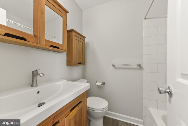 8995 Patterson Pl, Manassas, VA 20110 - full bathroom featuring vanity, wood finished floors, and shower / bath combination