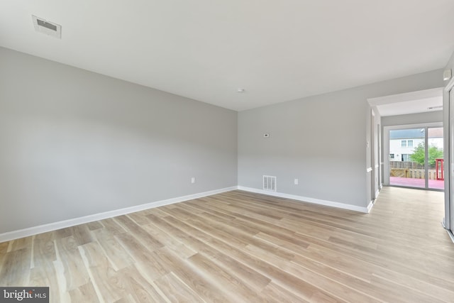8995 Patterson Pl, Manassas, VA 20110 - spare room featuring baseboards and light wood-style floors