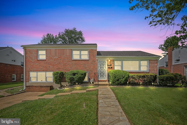 8328 Merrymount Dr, Baltimore, MD 21244 - tri-level home with a front lawn and brick siding