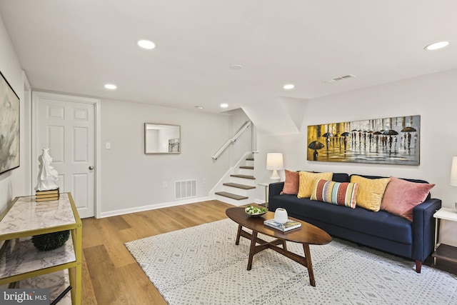 8328 Merrymount Dr, Baltimore, MD 21244 - living area with stairway, light wood-style flooring, and recessed lighting