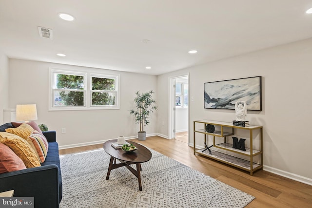 8328 Merrymount Dr, Baltimore, MD 21244 - living room featuring wood finished floors, plenty of natural light, and recessed lighting
