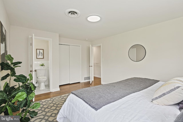 8328 Merrymount Dr, Baltimore, MD 21244 - bedroom with wood finished floors, a closet, and ensuite bathroom