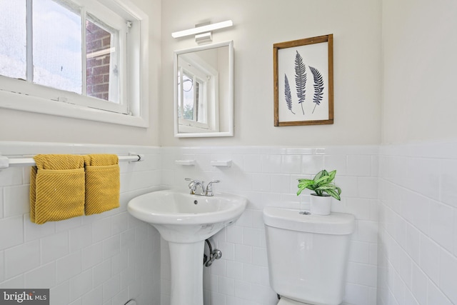 8328 Merrymount Dr, Baltimore, MD 21244 - half bathroom featuring tile walls and a wainscoted wall