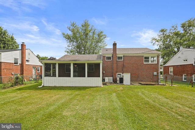 8328 Merrymount Dr, Baltimore, MD 21244 - rear view of property with a sunroom, a chimney, and brick siding