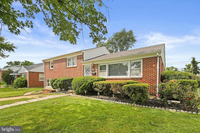 8328 Merrymount Dr, Baltimore, MD 21244 - split level home featuring brick siding and a front lawn
