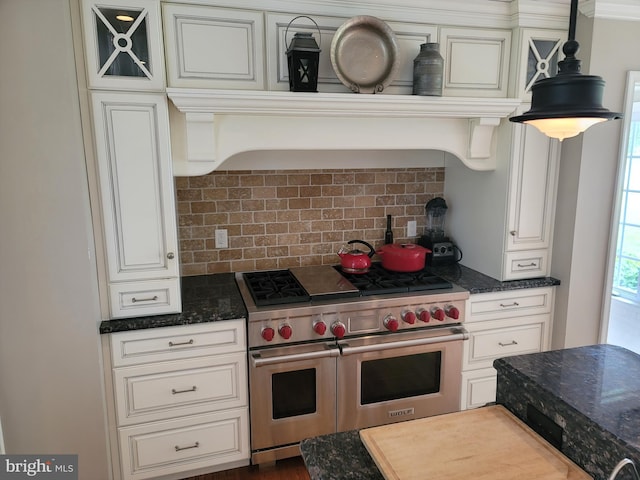 2424 Stanwick Rd, Phoenix, MD 21131 - kitchen featuring range with two ovens, tasteful backsplash, dark stone countertops, and white cabinets